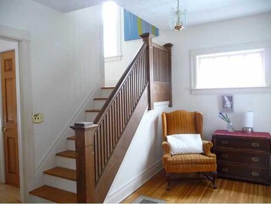 Foyer. THIS BEAUTIFUL STAIRWAY TURNS HALFWAY UP. N
