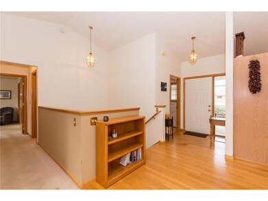 Another view of front entrance, staircase leading 