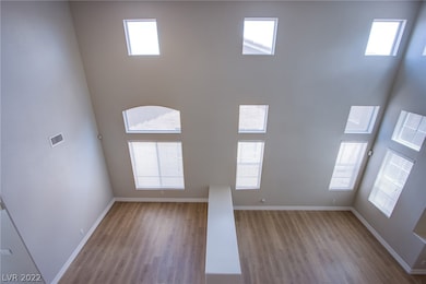 Living room at entry and dinning room divided by p