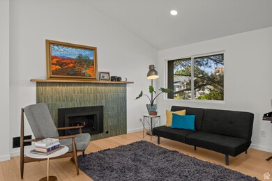 New gas fireplace with custom tile and oak mantle