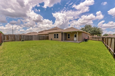 Spacious, fully fenced backyard with plenty of roo