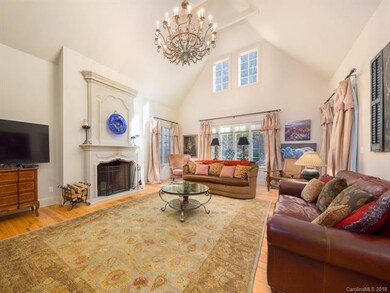 Living Room features: Chateau cast stone fireplace