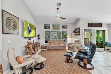 Great Room with sliders to pool deck and lanai