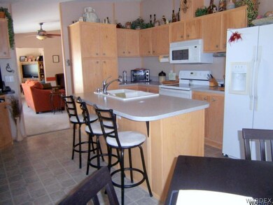 KITCHEN BAR TO LIVING RM