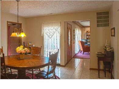 Dining room looking into living room.