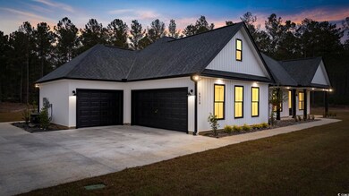 View of front of home featuring a lawn