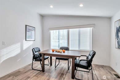 Easy care floors, neutral palette, trim millwork, window coverings throughout.