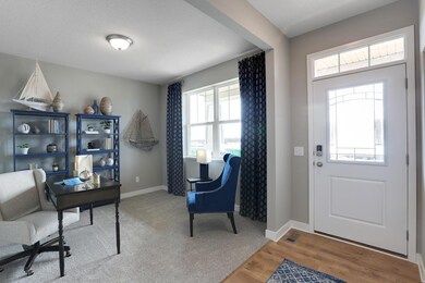 Great space right off the entrance!  Make it a study, play room, sitting room...anything you can imagine!  *Photo is of a model home.  Finishes in actual home may differ.
