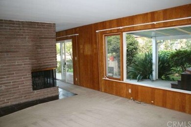Good sized living room with fireplace