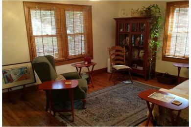 Living Room. Nice south facing window, all hardwoo