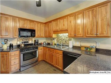 Kitchen has built in microwave and dishwasher, sta