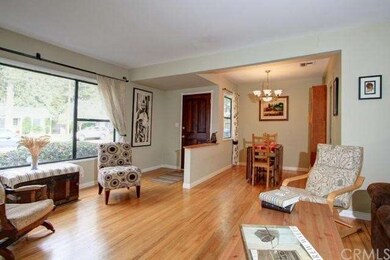 Living room with view of formal dining area