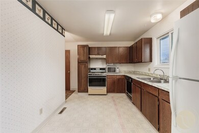 Kitchen w room for a small breakfast settee