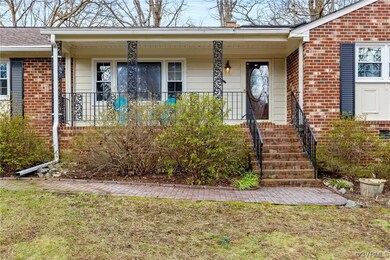 Doorway to property with covered porch