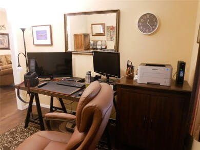 Office space featuring wood finished floors