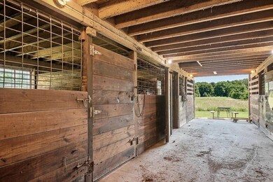 03_11975PuckerStreet_102_HorseStables_Lo