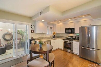 Modern and upgraded kitchen with granite, stainles