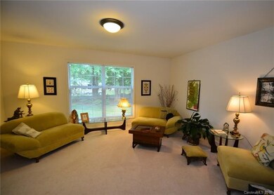 Light & Bright formal Living Room. Opens to Den an
