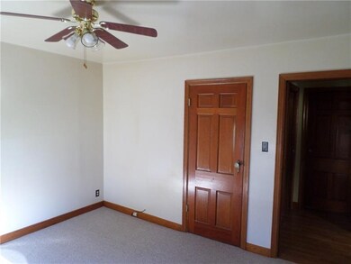 Front Bedroom on Main Floor features solid wood do