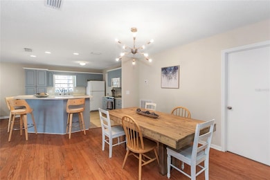 Dining room with unique chandelier