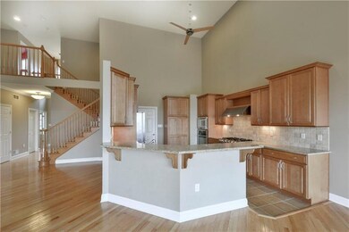 Large, open-concept with 18'+ high, vaulted ceilin
