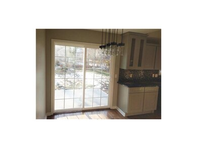 New sliding glass door and patio access from dinin