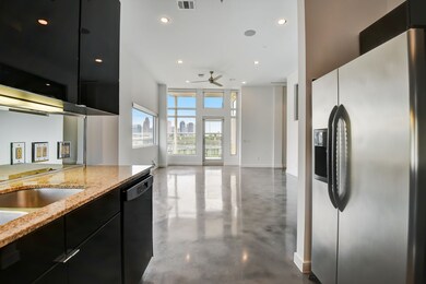 Modern, open concept living in a secure building.
