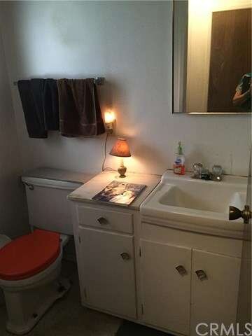 Half bath is conveniently located close to the kit