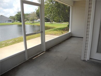 Area on screened porch for storage of grill, bikes