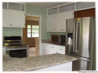 Kitchen with updated plumbing, lighting and floori