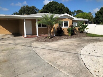 Front elevation with circular drive for extra park