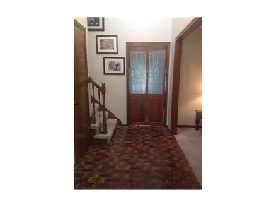 Entry with tile floor.