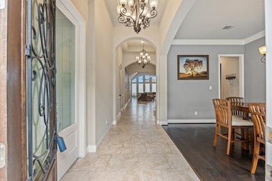 What a gorgeous entry! Formal dining is off to the