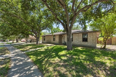 Check out this cute brick home.