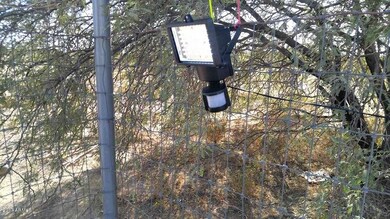 Solar motion light at gate