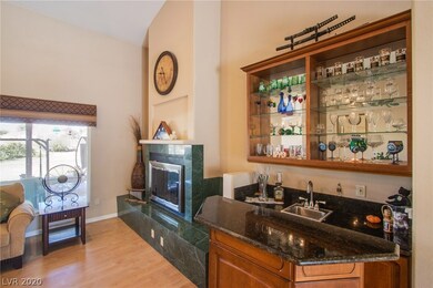 Large formal living room with marble fireplace and