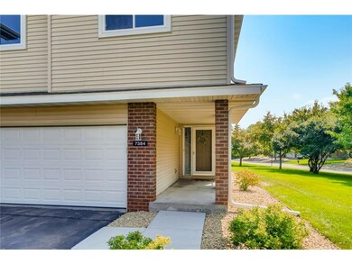 Entry way to home with rod iron rod railings.