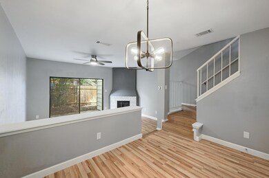 Unfurnished living room with wood finished floors