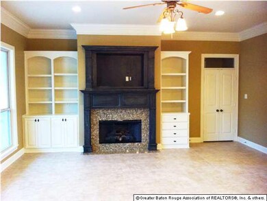 Living Room with Custom Built Ins and Faux Finishe