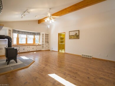 Vaulted ceilings and woods floors in the great roo