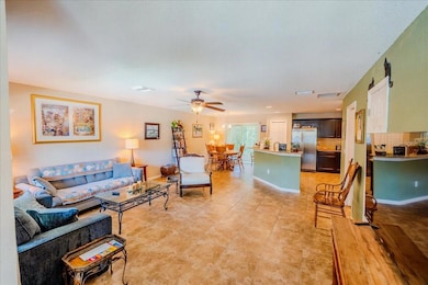 Den, Dining, and Kitchen Areas