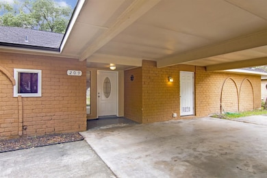 209 Dover - Great home with carport and extra storage outside.