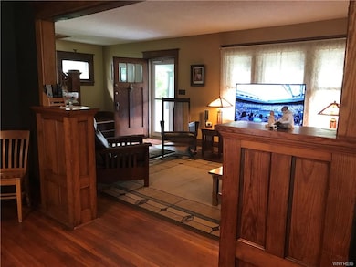 Original woodwork in the living and dining room.  