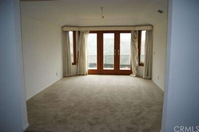 Formal Dining Room w/ Sliders to Patio