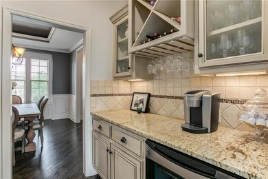 Continue through the butler's pantry with granite 