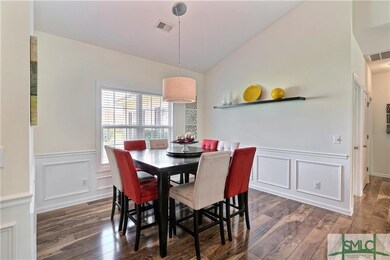 Dining area with wood floors