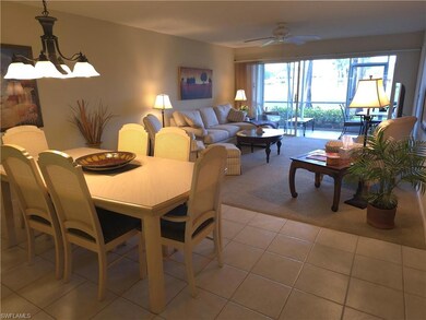 Dining room featuring light tile patterned floorin