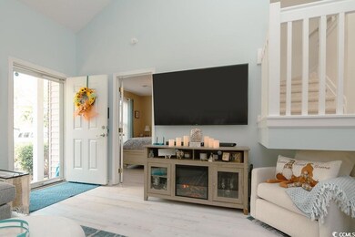 Living room featuring light hardwood / wood-style 