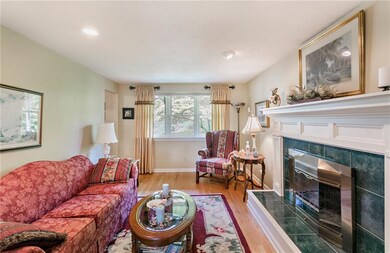 Just off the entry, this living room features a ga