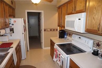Kitchen with Oak cabinets and appliances